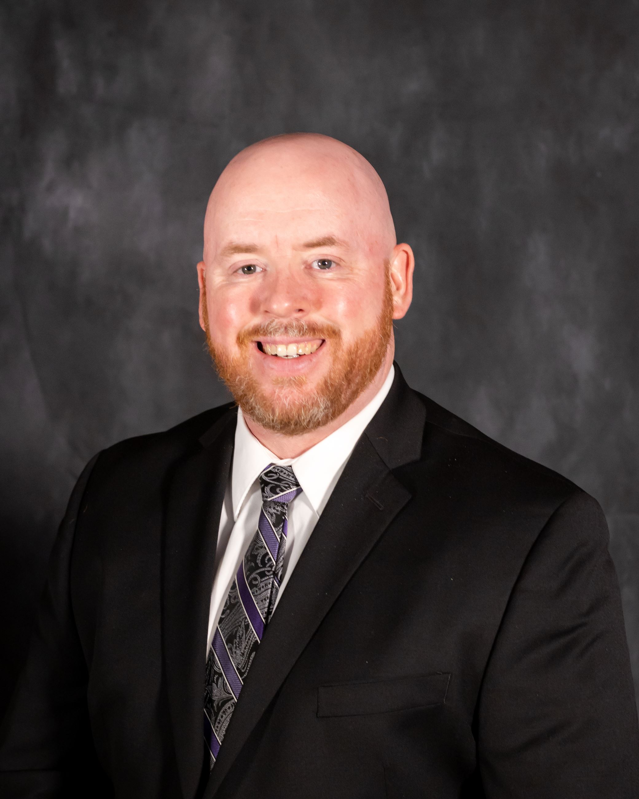 Professional photo of Chief Financial Officer, Jason Couture.