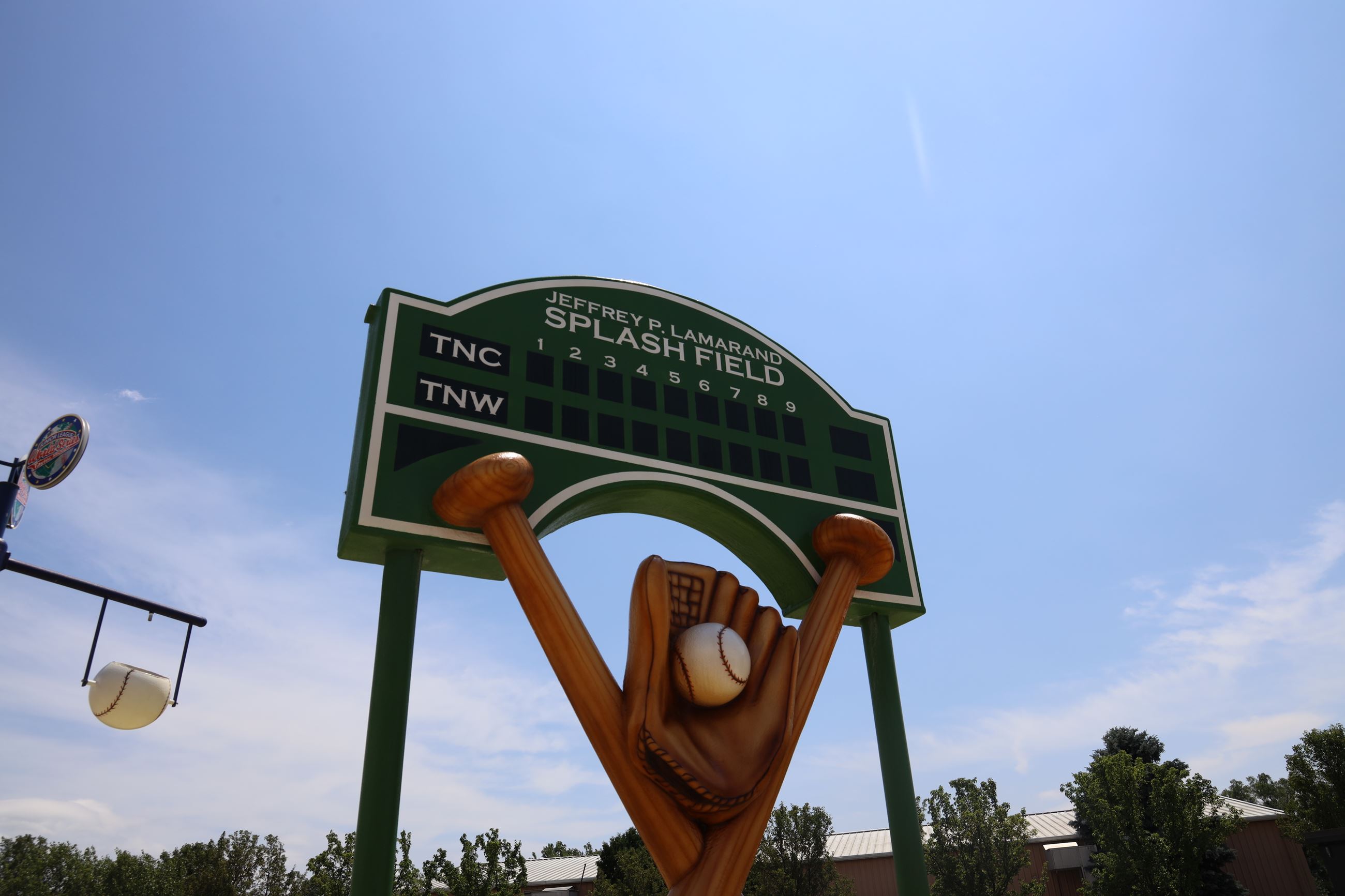 Close up of the baseball bat and scoreboard water features at the splash pad. 