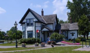 A large blue and white house.